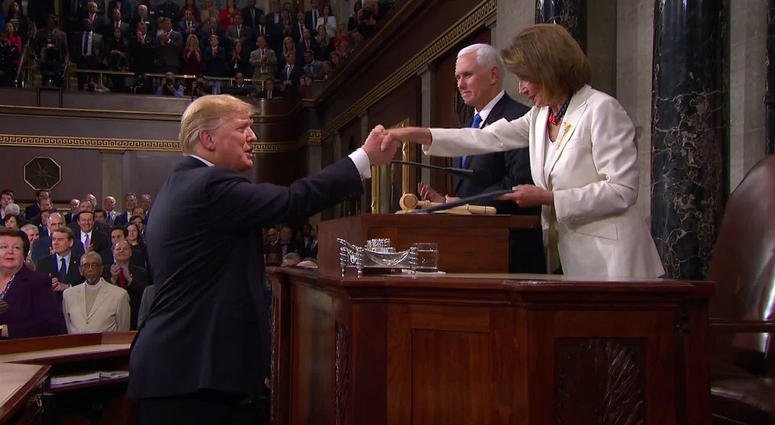 President Donald Trump and Speaker of the House Nancy Pelosi shake before the State of the Union address Tuesday night. Donald Trump and Nancy Pelosi
