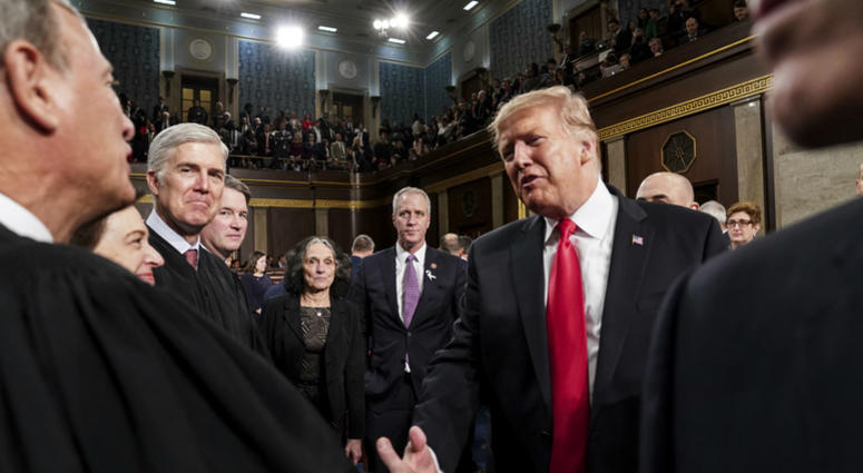 President Donald Trump talks to Supreme Court Chief Justice John Roberts while leaving the House chamber after giving his State of the Union address to a joint session of Congress, Tuesday, Feb. 5, 2019 at the Capitol in Washington. President Donald Trump talks to Supreme Court Chief Justice John Roberts while leaving the House chamber after giving his State of the Union address to a joint session of Congress, Tuesday, Feb. 5, 2019 at the Capitol in Washington.