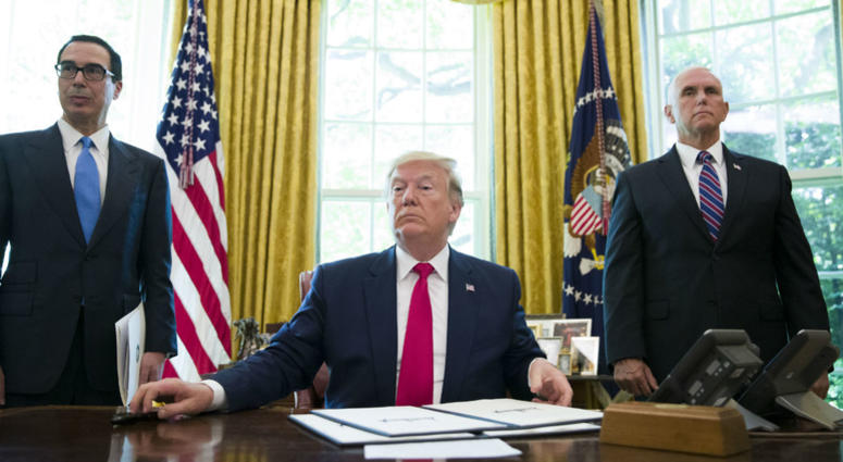 President Donald Trump listens to a reporter's question after signing an executive order to increase sanctions on Iran, in the Oval Office of the White House, Monday, June 24, 2019, in Washington. President Donald Trump listens to a reporter's question after signing an executive order to increase sanctions on Iran, in the Oval Office of the White House, Monday, June 24, 2019, in Washington.