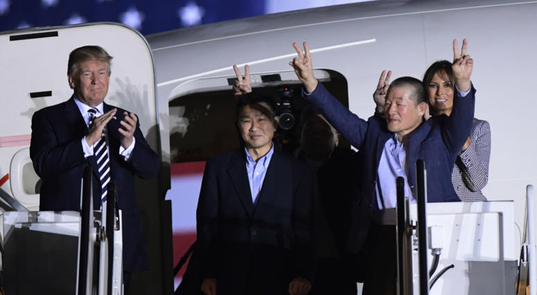 President Donald Trump, from left, greets Tony Kim, Kim Hak Song, seen in the shadow, and Kim Dong Chul, three Americans detained in North Korea for more than a year, as they arrive at Andrews Air Force Base in Md., Thursday, May 10, 2018. President Donald Trump, from left, greets Tony Kim, Kim Hak Song, seen in the shadow, and Kim Dong Chul, three Americans detained in North Korea for more than a year, as they arrive at Andrews Air Force Base in Md., Thursday, May 10, 2018.