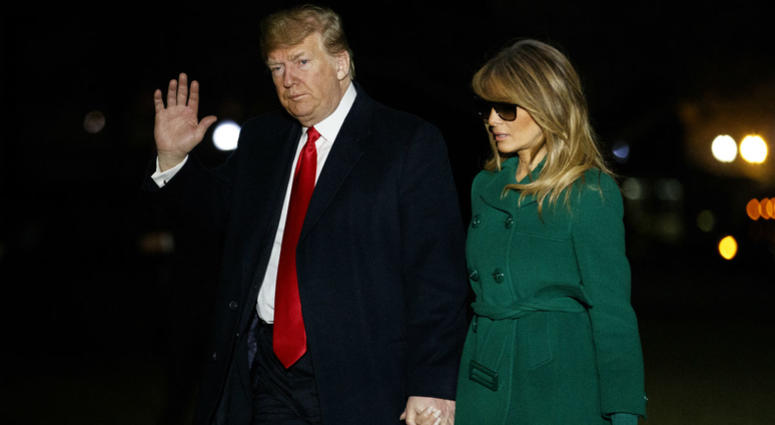 President Donald Trump and first lady Melania Trump arrive on the South Lawn of the White House after making a surprise visit to troops in Iraq, Thursday, Dec. 27, 2018, in Washington. President Donald Trump and first lady Melania Trump arrive on the South Lawn of the White House after making a surprise visit to troops in Iraq, Thursday, Dec. 27, 2018, in Washington.
