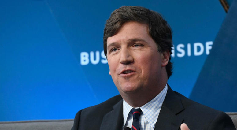 Police were called to the Washington, D.C. home of Fox News host Tucker Carlson on Wednesday night when a group of protesters showed up and shouted threats. Tucker Carlson