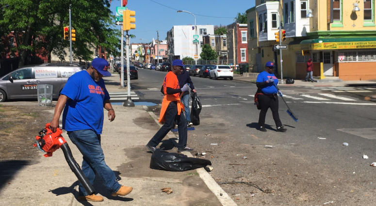 Members of One Day At A Time clean up parts of North Philadelphia near off-campus housing for Temple University students. One Day At A Time