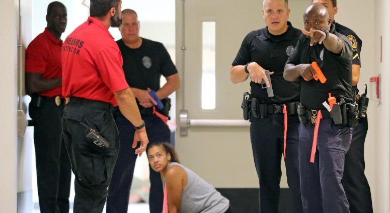 North Miami Police Department and Miami-Dade County Public Schools Police take part in an active shooter drill at North Miami Senior High on Tuesday, July 24, 2018. North Miami Police Department and Miami-Dade County Public Schools Police take part in an active shooter drill at North Miami Senior High on Tuesday, July 24, 2018.