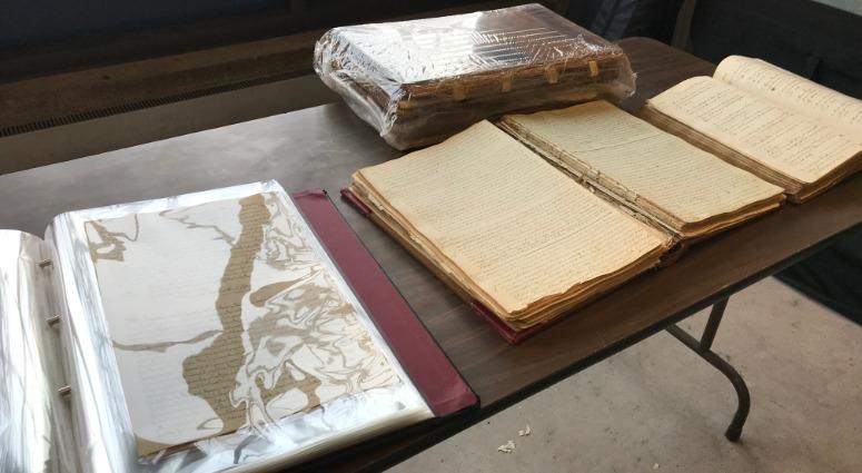 Old deed books (right) next to the newly restored deed books in Bucks County. Old deed books (right) next to the newly restored deed books in Bucks County.