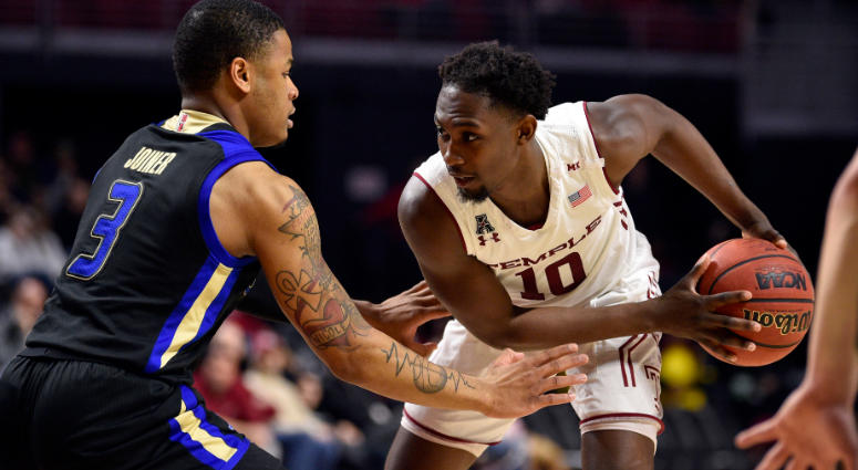 Temple Owls guard Shizz Alston Jr. (10) works the ball against Tulsa Golden Hurricane guard Elijah Joiner (3) during the second half at Liacouras Center, Feb. 23, 2019. Temple Owls guard Shizz Alston Jr.