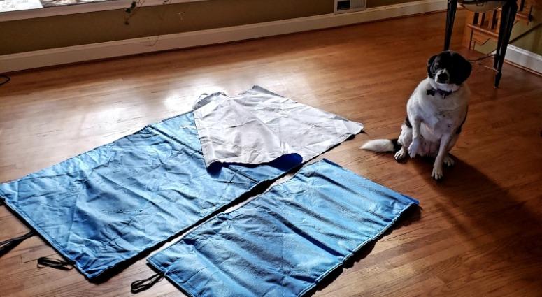 Laura Faust creates blankets and mats for the homeless out of upcycled material used for wrapping surgical instruments. Pictured: Faust's dog. Laura Faust creates blankets and mats for the homeless out of upcycled material used for wrapping surgical instruments. Pictured: Faust's dog.