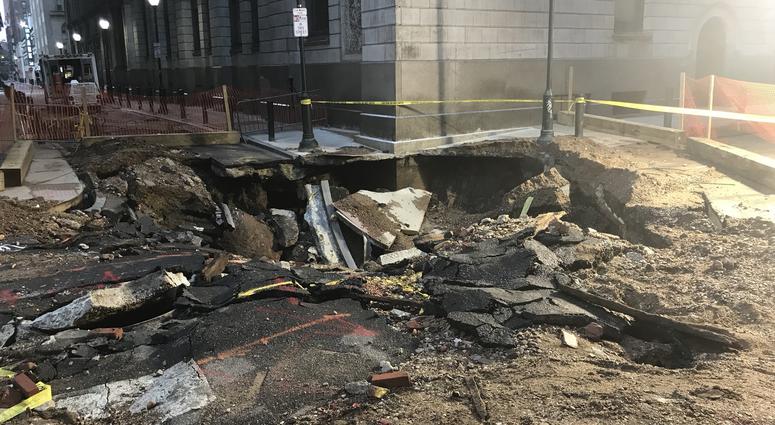 Several businesses are without water as the work continues. water main break damage