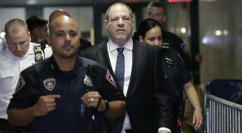Harvey Weinstein, center, enters State Supreme Court, Thursday, Oct. 11, 2018 in New York. Harvey Weinstein, center, enters State Supreme Court, Thursday, Oct. 11, 2018 in New York.