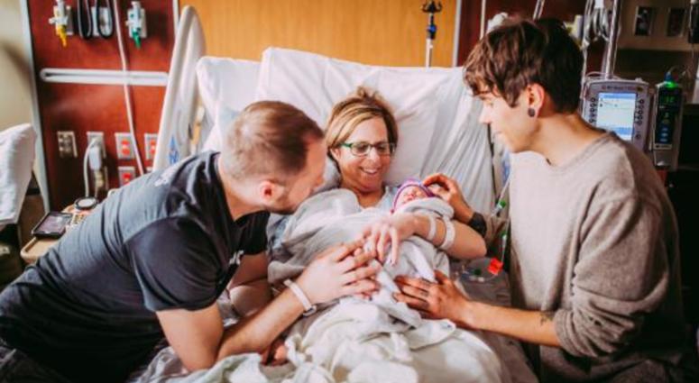 A gay couple had a child with the help of the child's grandmother, who carried and delivered the girl. Grandmother gives birth to her own granddaughter