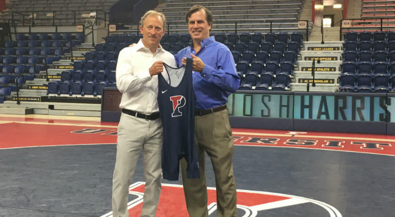 Philadelphia 76ers owner Josh Harris (left) has given a $1 million gift to the wrestling program at his alma mater, the University of Pennsylvania, where Roger Reina (right) is head coach. Philadelphia 76ers owner Josh Harris (left) has given a $1 million gift to the wrestling program at his alma mater, the University of Pennsylvania, where Roger Reina (right) is head coach.