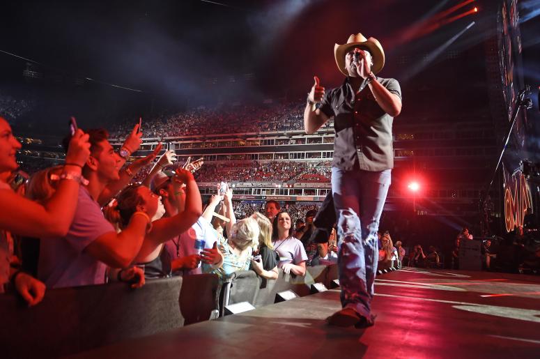 Jun 9, 2016; Nashville, TN, USA; Recording artist Jason Aldean performs during the CMA Fest at Nissan Stadium.