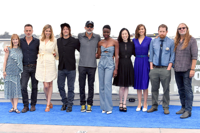 Cast of AMC's "The Walking Dead" at San Diego Comic-Con 2018 SAN DIEGO, CA - JULY 20: (L-R) Gale Ann Hurd, Andrew Lincoln, Denise M. Huth, Norman Reedus, Jeffrey Dean Morgan, Danai Gurira, Angela Kang, Lauren Cohan, Scott M. Gimple and Greg Nicotero attend 'The Walking Dead' Photo Call during Comic-Con Internationa