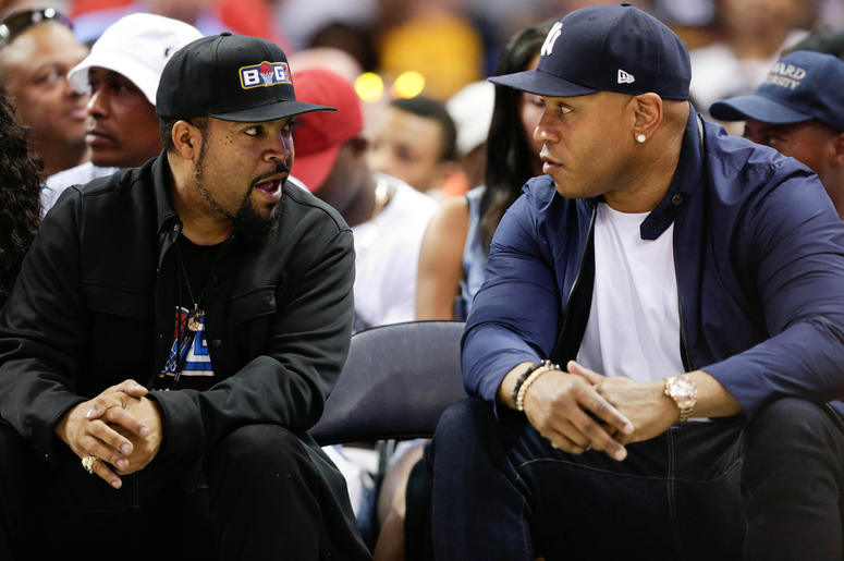 Ice Cube and LL Cool J Jul 2, 2017; Charlotte, NC, USA; Movie actor Ice Cube and actor LL Cool J talk during the game between 3's Company and Ghost Ballers at Spectrum Center. Mandatory Credit: Jeremy Brevard-USA TODAY Sports