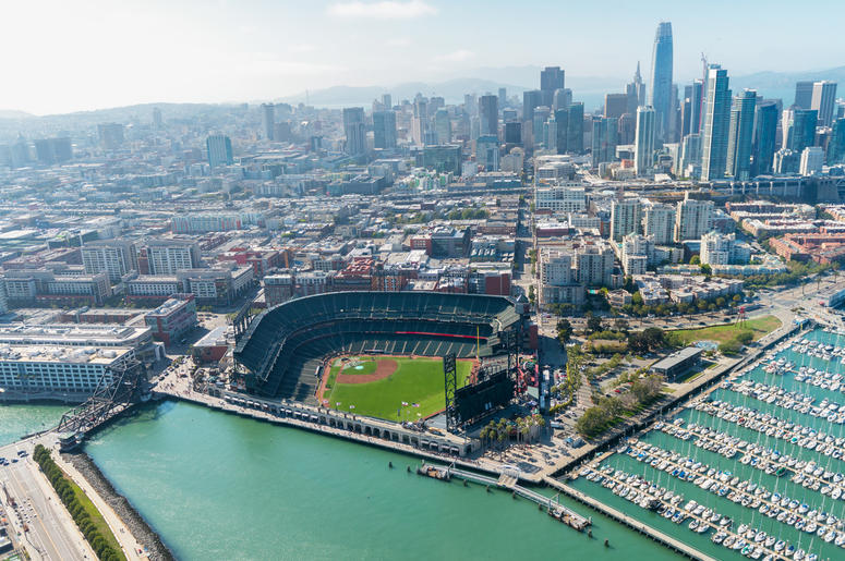 Aerial view of San Francisco skyline and AT&T Park on a beautiful sunny summer. Aerial view of San Francisco skyline and AT&T Park on a beautiful sunny summer. (Photo credit: ©Giovanni Gagliardi/Dreamstime)