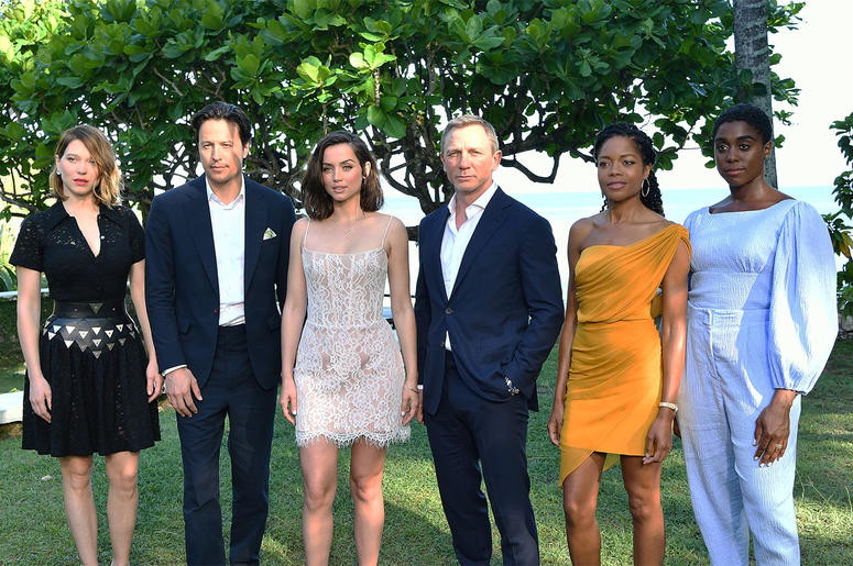 Cast of Bond 25 MONTEGO BAY, JAMAICA - APRIL 25: (L-R) Cast member Lea Seydoux, director Cary Joji Fukunaga, cast members Ana de Armas, Daniel Craig, Naomie Harris and Lashana Lynch attend the "Bond 25" film launch at Ian Fleming's Home 'GoldenEye' on April 25, 2019 in M