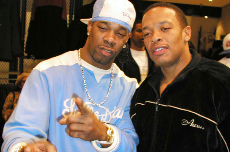 Busta Rhymes and Dr. Dre BEVERLY HILLS, CA - JANUARY 13: Actors/rappers Busta Rhymes (L) and Dr. Dre pose at the Nike and Universal Music presents Nelly and St. Lunatics American Music Awards Party Co-sponsored by Remy at the Nike store on January 13, 2003 in Beverly Hills, Calif