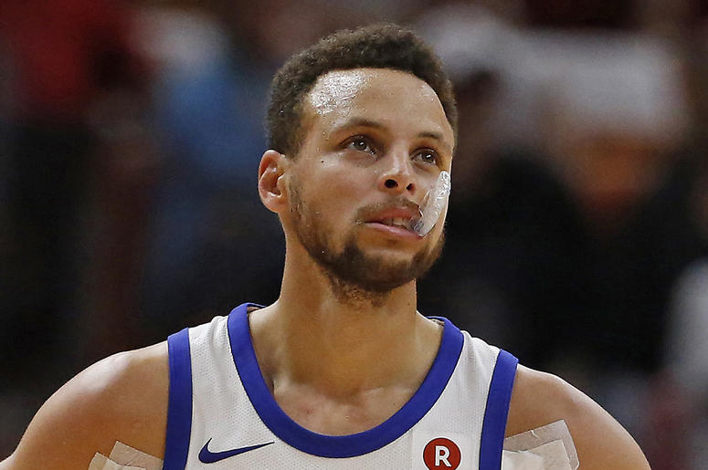 Golden State Warriors' Stephen Curry Golden State Warriors guard Stephen Curry looks on during the second quarter against the Miami Heat on Sunday, Dec. 3, 2017 at AmericanAirlines Arena in Miami, Fla. (Photo by David Santiago/Miami Herald/TNS/Sipa USA)