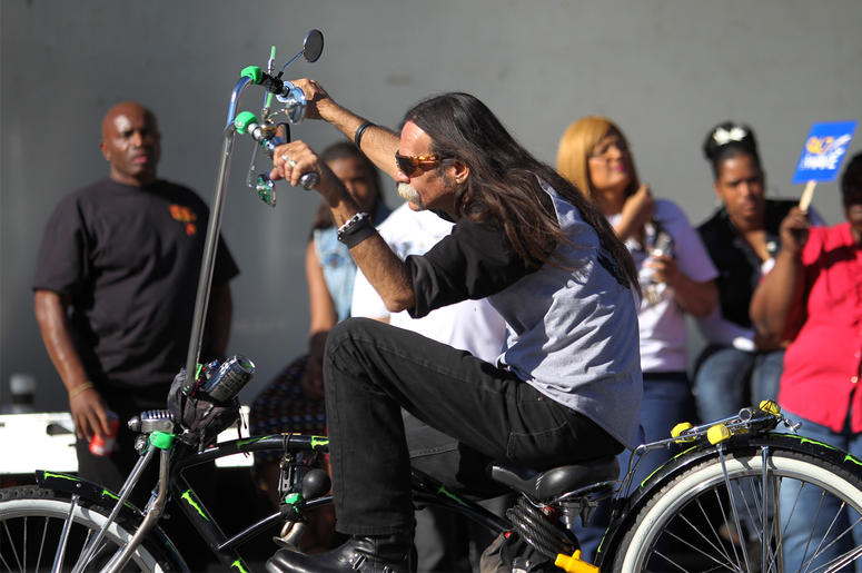 Lowrider Bicycle Annual MLK Day Parade Marches Through Los Angeles LOS ANGELES, CA - JANUARY 20: A man rides a custom lowrider bicycle in the 29th annual Kingdom Day Parade on January 20, 2014 in Los Angeles, California. The Kingdom Day Parade honors the memory of African