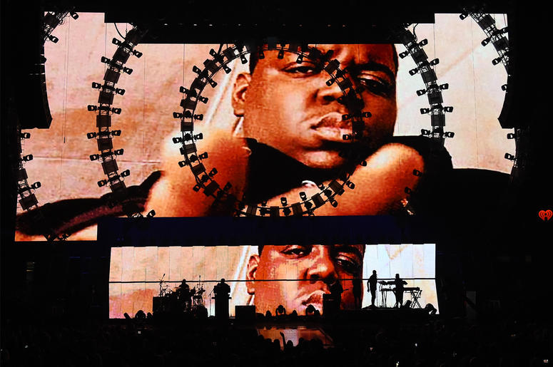 Notorious B.I.G. LAS VEGAS, NV - SEPTEMBER 19: Images of the late rapper The Notorious B.I.G. are shown during a performance by recording artist Sean 'Puff Daddy' Combs at the 2015 iHeartRadio Music Festival at MGM Grand Garden Arena on September 19, 2015 in Las Vegas, Ne