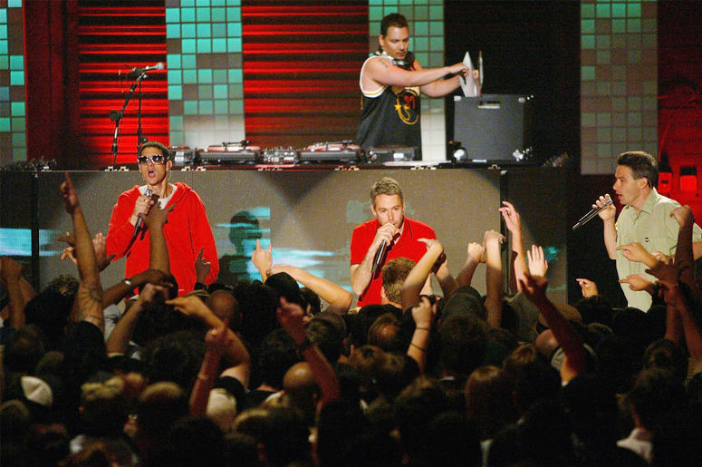 Michael Diamond 'Mike D', Adam Yauch 'MCA', Adam Horovitz 'Ad-Rock' and DJ Mix Master Mike of the Beastie Boys LAS VEGAS, NV - JUNE 9: (L-R) Michael Diamond 'Mike D', Adam Yauch 'MCA', Adam Horovitz 'Ad-Rock' and DJ Mix Master Mike(behind) of the Beastie Boys perform during MTV2's 2$Bill concert series at the Huntridge Theater, June 9, 2004 in Las Vegas, Nevada. (