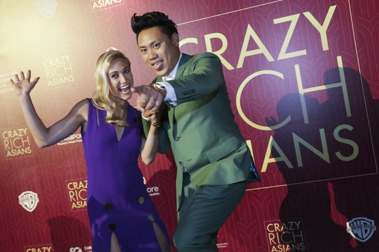 6ab2217fbb774e41acfad93c7ff02011 Director John Chu and his wife Kristin Hodge pose for photographers as they arrive for the red carpet screening of the movie "Crazy Rich Asians" on Tuesday, Aug. 21, 2018, in Singapore. (AP Photo/Don Wong)