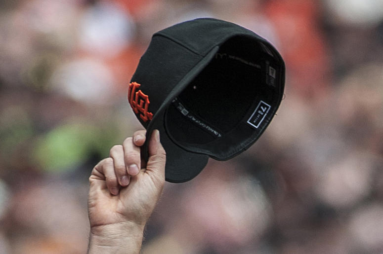 Hats Off - San Francisco Giants Cap Apr 6, 2013; San Francisco, CA, USA; San Francisco Giants catcher Buster Posey (28) tips his cap to the crowd before the game against the St. Louis Cardinals at AT&T Park. Mandatory Credit: Ed Szczepanski-USA TODAY Sports