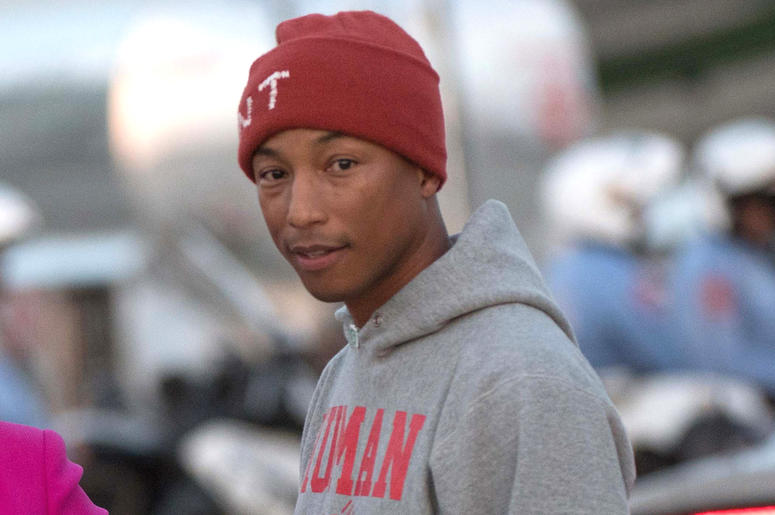 Pharrell Williams Nov 3, 2016; Raleigh, NC, USA; Democratic presidential candidate Hillary Clinton (not pictured) arriving at Raleigh-Durham International Airport talking with singer Pharrell Williams. Mandatory Credit: Jack Gruber-USA Today Network