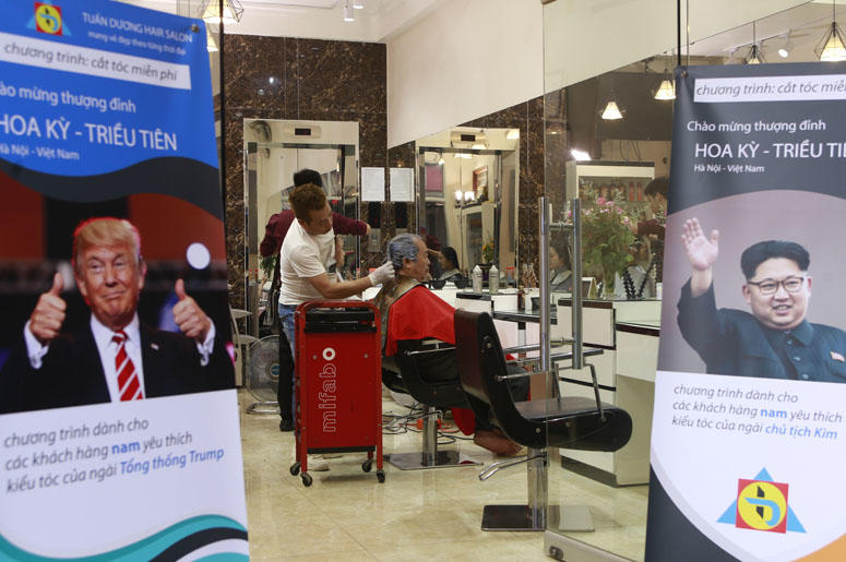 Le Phuc Hai, 66, receives a Trump haircut in Hanoi, Vietnam, on Tuesday, Feb. 19, 2019. U.S. President Donald Trump and North Korean leader Kim Jong Un have become the latest style icons in Hanoi, a week before their second summit is to be held in the cap