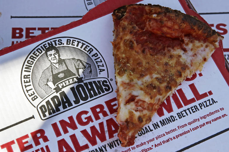 AP17355686740335 This Dec. 21, 2017, file photo shows a slice of cheese pizza at the Papa John's pizza shop in Quincy, Mass. Papa John’s plans to pull Schnatter’s image from marketing materials after reports he used a racial slur. Schnatter apologized Wednesday, July 11,
