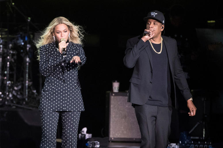 AP18197603519874 In this Nov. 4, 2016 file photo, Beyonce, center, and Jay-Z perform during a Democratic presidential candidate Hillary Clinton campaign rally in Cleveland. Beyonce and Jay-Z, who recently released a collaborative album as The Carters, are nominated for ei