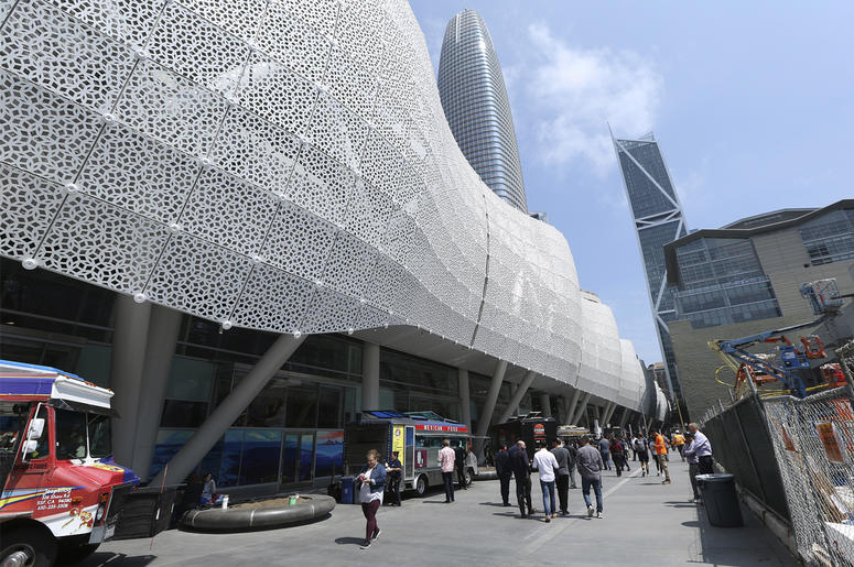 AP18227858279724 In this photo taken Wednesday, Aug. 15, 2018, food trucks beckon workers outside the new Transbay Transit Center in San Francisco. The new $2.2 billion center opened earlier this month. (AP Photo/Lorin Eleni Gill)