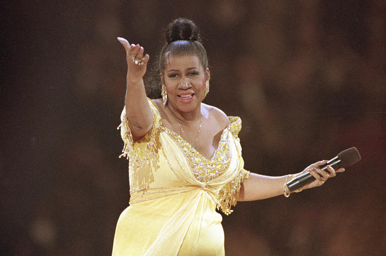 AP18228485289707 In this Jan. 19, 1993 file photo, singer Aretha Franklin performs at the inaugural gala for President Bill Clinton in Washington. Franklin died Thursday, Aug. 16, 2018 at her home in Detroit. She was 76. (AP Photo/Amy Sancetta, File)
