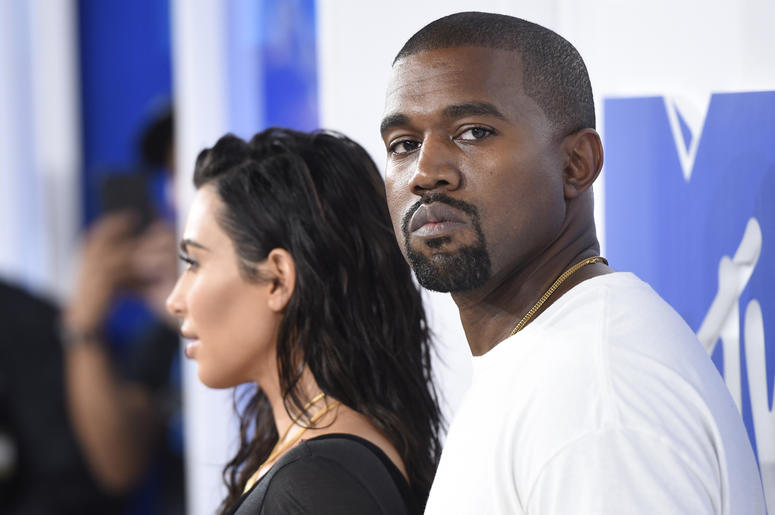 AP18241735484892 In this Aug. 28, 2016 file photo, Kim Kardashian West, left, and Kanye West arrive at the MTV Video Music Awards in New York. Kanye West has apologized on a Chicago radio station for suggesting slavery was a "choice." (Photo by Evan Agostini/Invision/AP,