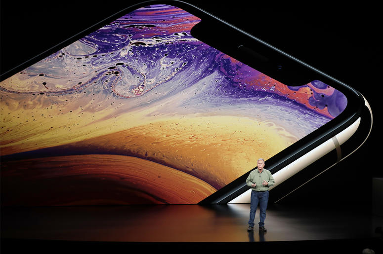 AP18255639192638 Phil Schiller, Apple's senior vice president of worldwide marketing, speaks about the Apple iPhone XS at the Steve Jobs Theater during an event to announce new Apple products Wednesday, Sept. 12, 2018, in Cupertino, Calif. (AP Photo/Marcio Jose Sanchez)