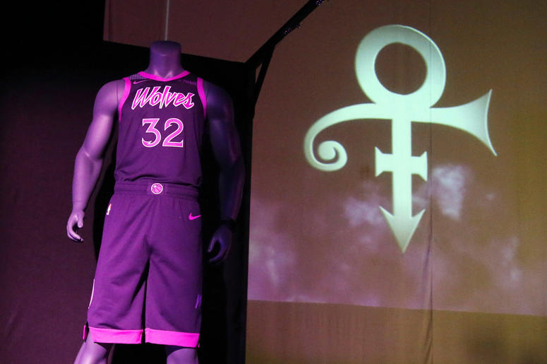AP18305596074357 The new City Edition Minnesota Timberwolves uniform, honoring the legacy of the late rock star Prince, is unveiled Thursday, Nov. 1, 2018, in Chanhassen, Minn. The NBA basketball team is scheduled to wear the Prince-inspired uniforms eight times during th