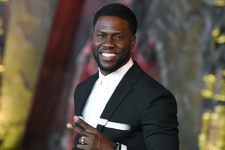 AP18339059606914 In this Dec. 11, 2017 file photo, Kevin Hart arrives at the Los Angeles premiere of "Jumanji: Welcome to the Jungle" in Los Angeles. Hart will host the 2019 Academy Awards, fulfilling a lifelong dream for the actor-comedian. Hart announced Tuesday, Dec. 4