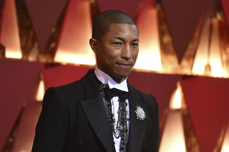 AP18343282919957 In this Feb. 26, 2017, file photo, Pharrell Williams arrives at the Oscars at the Dolby Theatre in Los Angeles. Cardi B, Pharrell, Kanye West were among the celebrities who fanned out across Miami for a week of glamorous parties toasting the world’s best