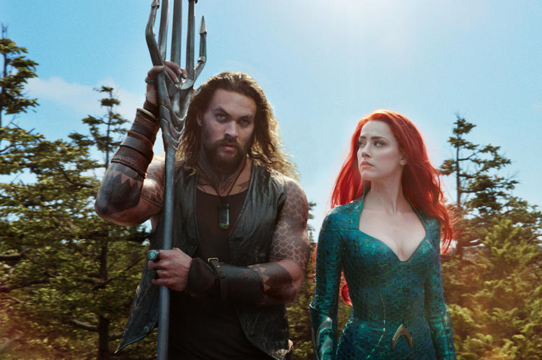 AP18357562388438 This image released by Warner Bros. Pictures shows Jason Momoa, left, and Amber Heard in a scene from "Aquaman." (Warner Bros. Pictures via AP)