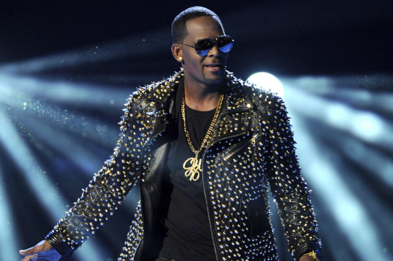 AP19008793893025 In this June 30, 2013 file photo, R. Kelly performs at the BET Awards in Los Angeles. A Georgia man involved with a recent documentary detailing abuse allegations against R. Kelly told police the singer's manager threatened him. A Stockbridge police repor