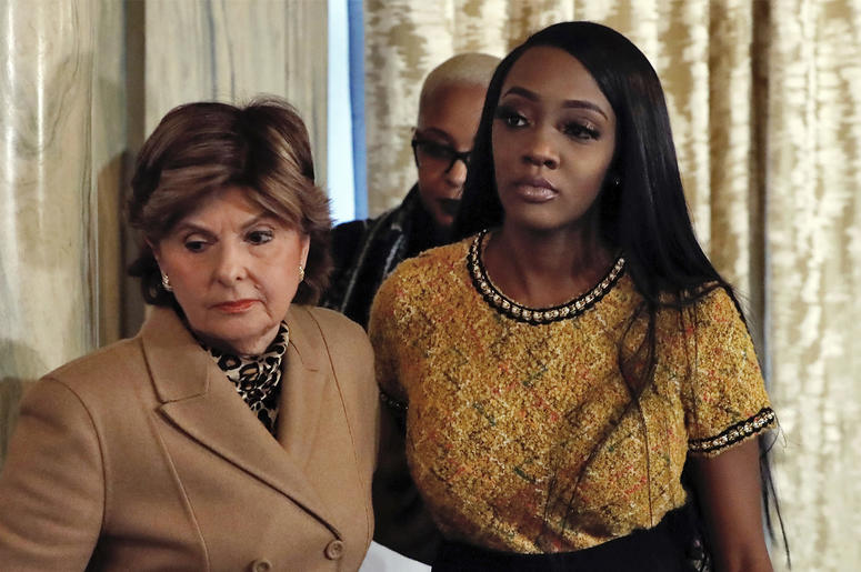 AP19014657329117 Attorney Gloria Allred, left escorts Faith Rogers after a news conference about R&B singer R. Kelly in New York, Monday, Jan. 14, 2019. Kelly has been under fire since the recent airing of a Lifetime documentary "Surviving R. Kelly ." He has denied all al