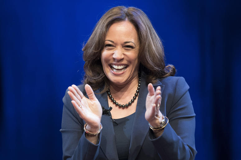 AP19021439945544 In this Jan. 9, 2019 photo, Sen. Kamala Harris, D-Calif., greets the audience at George Washington University in Washington, during an event kicking off her book tour. Harris, a first-term senator and former California attorney general known for her rigor