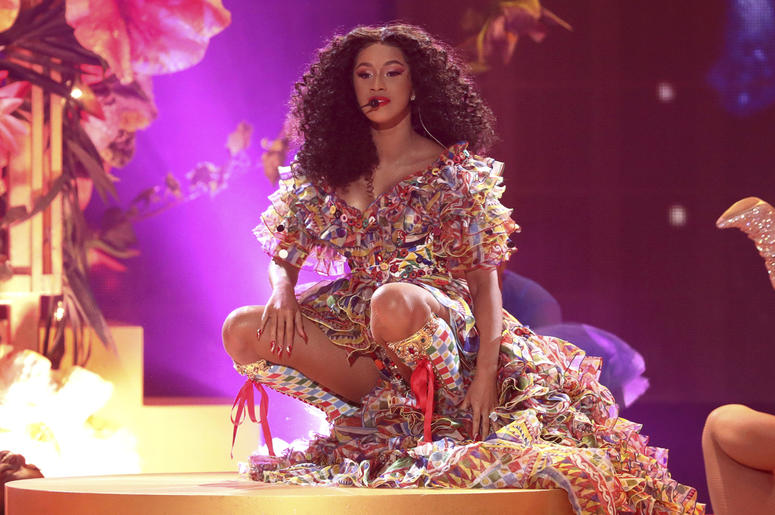 AP19033138388526 In this Tuesday, Oct. 9, 2018 file photo, Cardi B performs "I Like It" at the American Music Awards at the Microsoft Theater in Los Angeles. Cardi B says she received an offer to perform at the Super Bowl, but struggled with the decision to turn down the