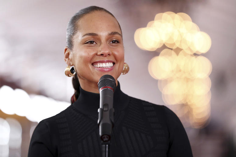 AP19038727907863 Host Alicia Keys speaks to the media after rolling out the red carpet for the 61st annual Grammy Awards on Thursday, Feb. 7, 2019, in Los Angeles. The 61st Grammy Awards will be held on Sunday, Feb. 10. (Photo by Matt Sayles/Invision/AP)
