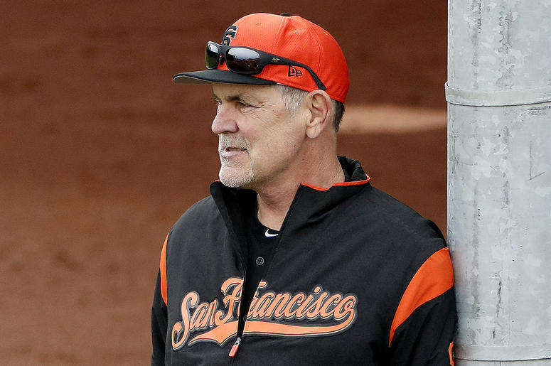 AP19049711554764 In this Feb. 13, 2019, file photo, San Francisco Giants manager Bruce Bochy watches his team during a baseball spring training practice, in Scottsdale, Ariz. Bochy says he will retire after this season, his 25th as a big league manager. Bochy says he told