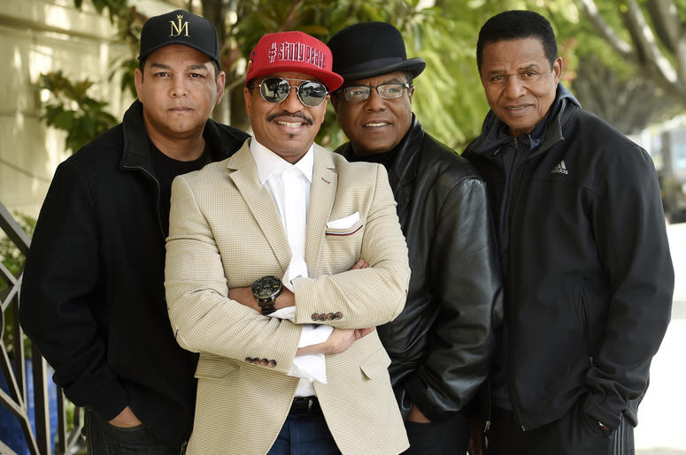 AP19057792689435 In this Tuesday, Feb. 26, 2019 photo, Marlon Jackson, second from left, Tito Jackson, second from right, and Jackie Jackson, far right, brothers of the late musical artist Michael Jackson, and Tito's son Taj, far left, pose together for a portrait outside