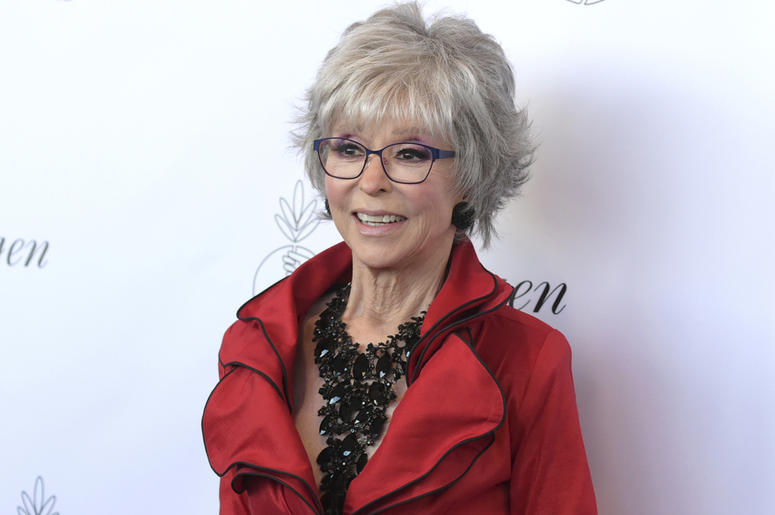 AP19087618050684 In this Aug. 25, 2018, file photo, Rita Moreno arrives at the 33rd annual Imagen Awards in Los Angeles. (Photo by Richard Shotwell/Invision/AP, File)