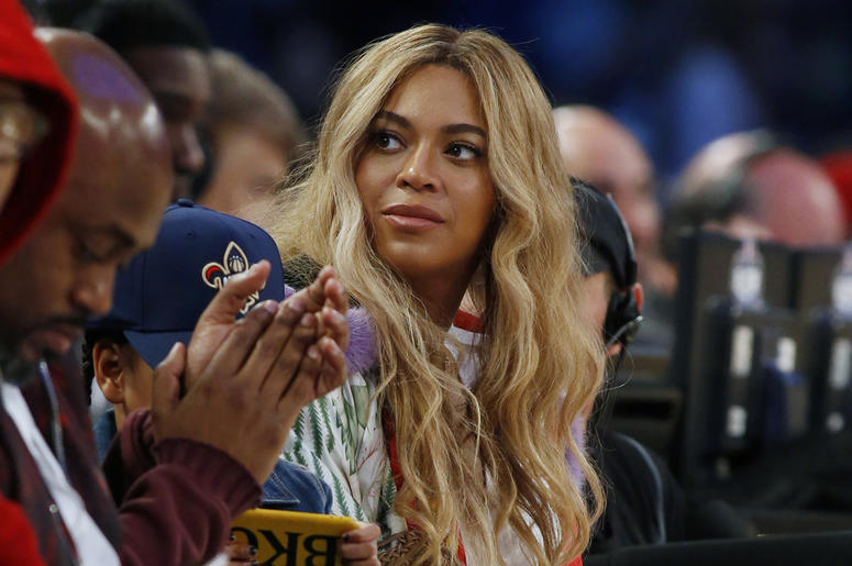 AP19094611393740 In this Feb. 19, 2017. file photo, Beyonce sits at court side during the second half of the NBA All-Star basketball game in New Orleans. (AP Photo/Max Becherer, File)