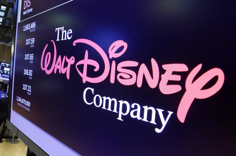 AP19101647557211 In this Aug. 8, 2017, file photo, The Walt Disney Co. logo appears on a screen above the floor of the New York Stock Exchange.