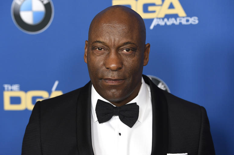 AP19110734540449 In this Feb. 3, 2018 file photo, John Singleton arrives at the 70th annual Directors Guild of America Awards in Beverly Hills, California. (Photo by Chris Pizzello/Invision/AP)